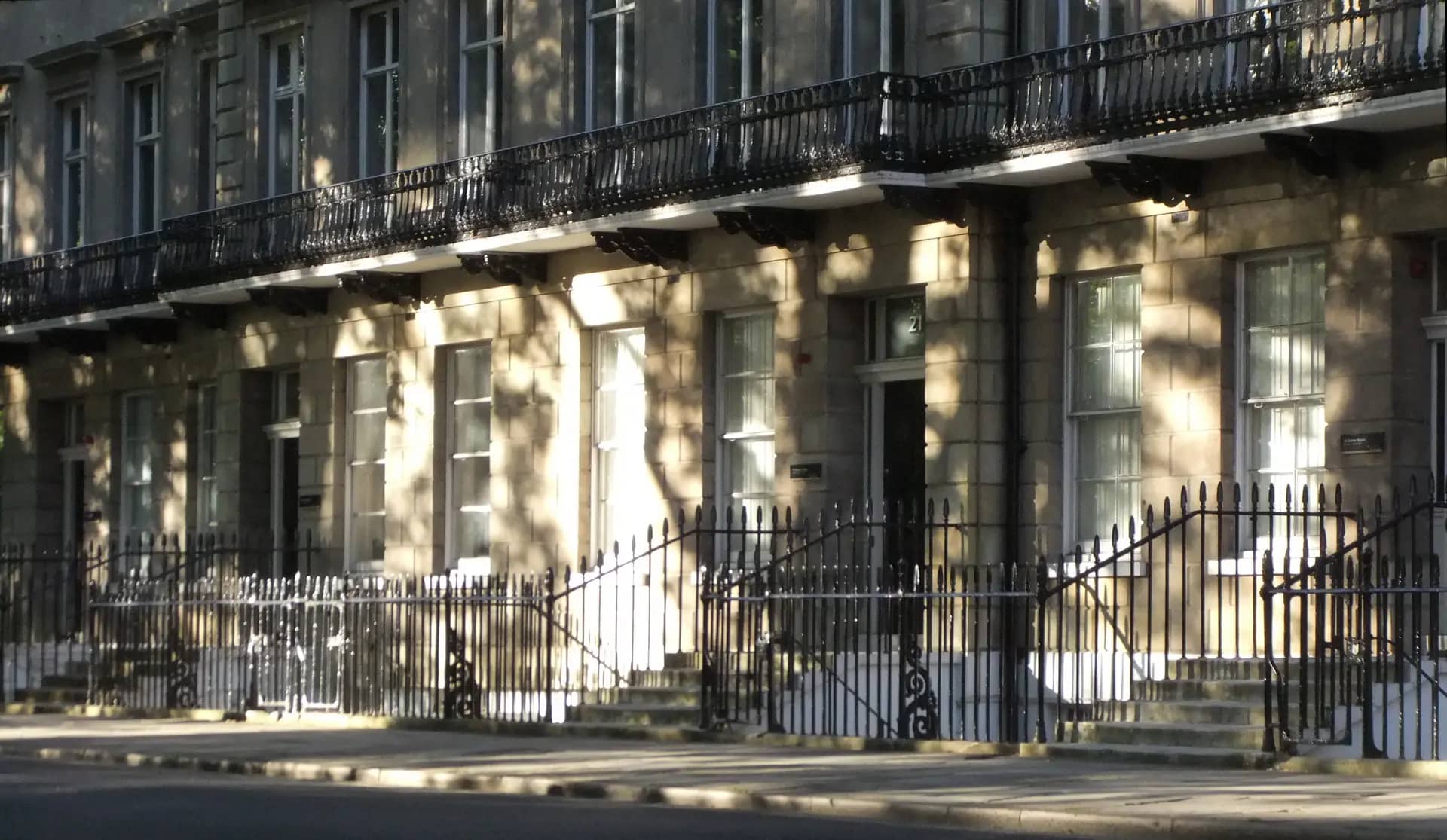 Georgian terrace with railings in Bloomsbury, the sort of setting where a design statement explains how a rear addition respects the original