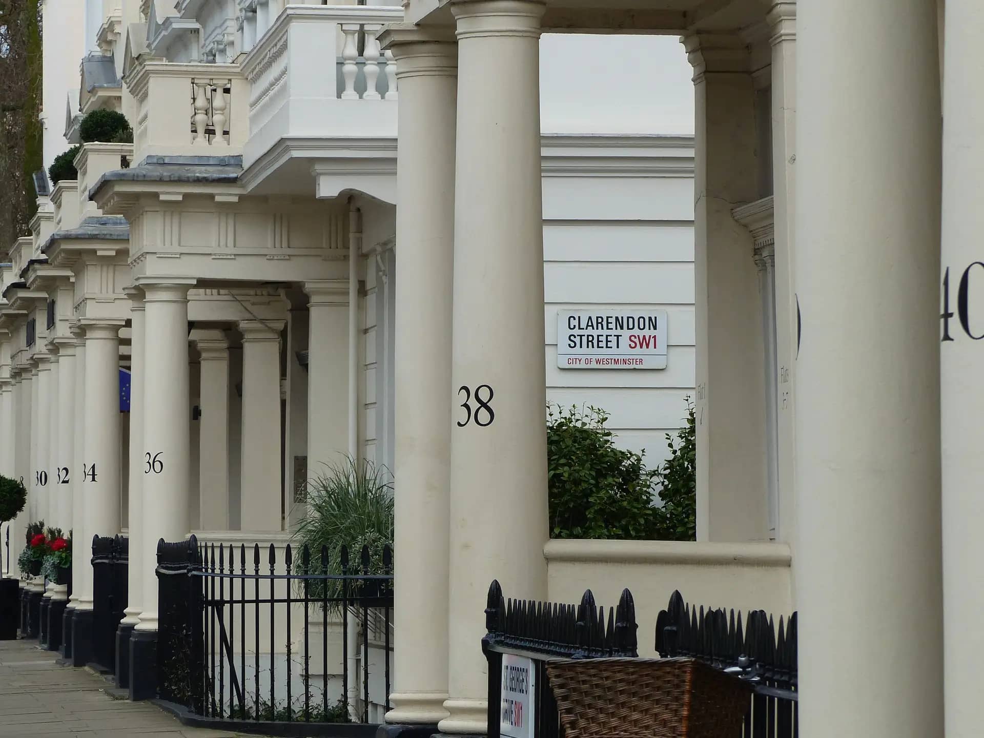 Victorian terraced houses with tiled porches in London, whose rear extensions are commonly priced by several builders