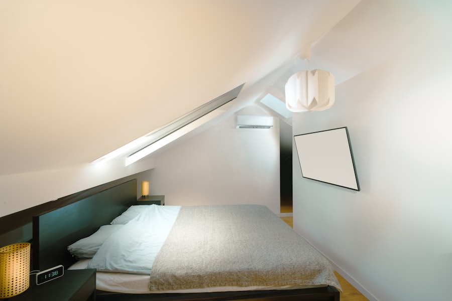 Loft conversion in London — bedroom under a sloped ceiling with skylight